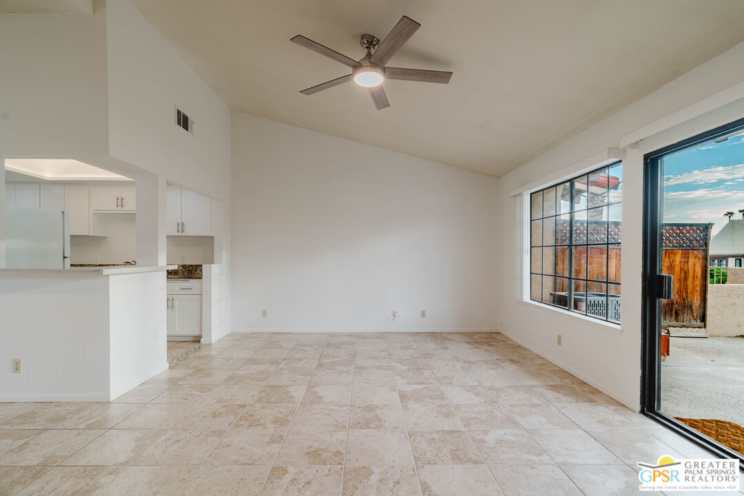 46400 Ryway Place, Unit 10 Palm Desert, CA 92260 - Photo 3 of 48 a view of an empty room with a window