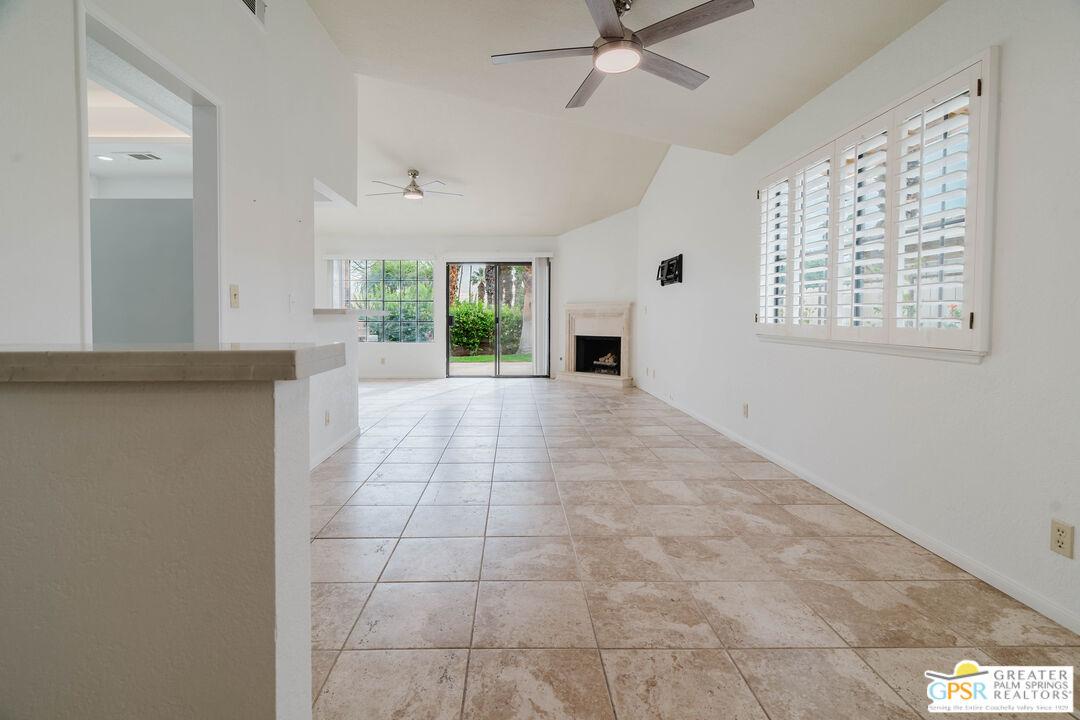 46400 Ryway Place, Unit 10 Palm Desert, CA 92260 - Photo 38 of 48 a view of an empty room with a window