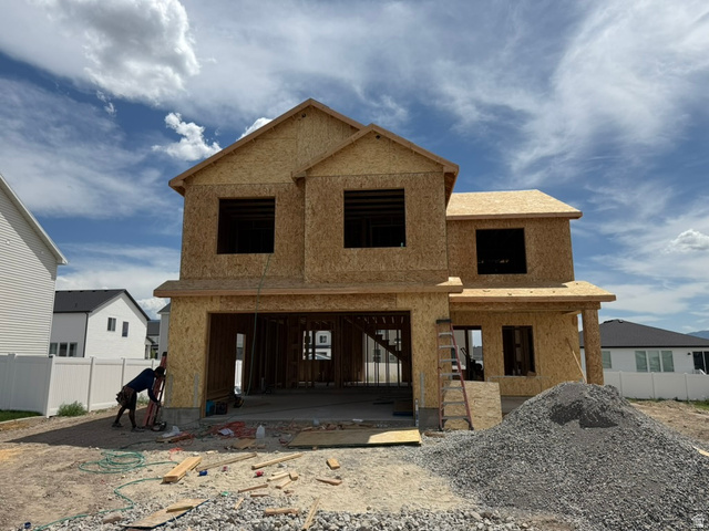 250 West 550 North Smithfield, UT 84335 - Photo 1 of 8 New construction residential property featuring a two-story design, attached two-car garage, and a covered entry