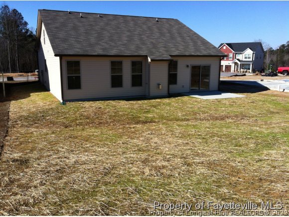 360 River Oak Street Spring Lake, NC 28390 - Photo 15 of 15 a house view with a backyard space