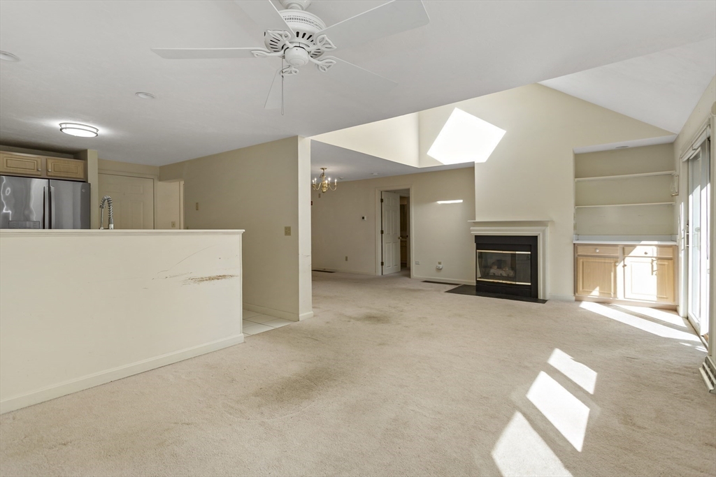 3 Kettle Lane, Unit 3 Mashpee, MA 02649 - Photo 9 of 24 a view of a livingroom with a fireplace