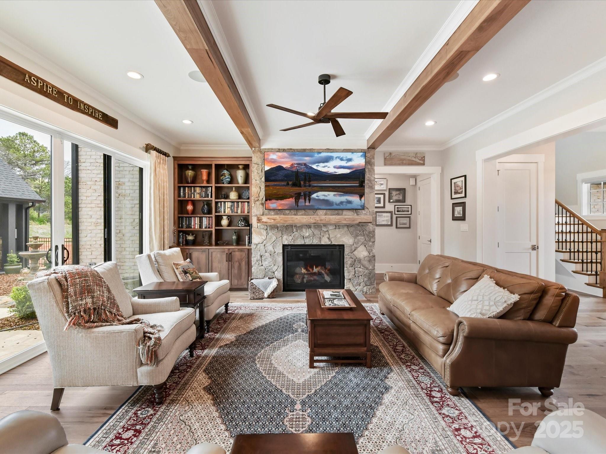 406 Sugar Maple Lane Weddington, NC 28104 - Photo 19 of 48 a living room with furniture and a fireplace