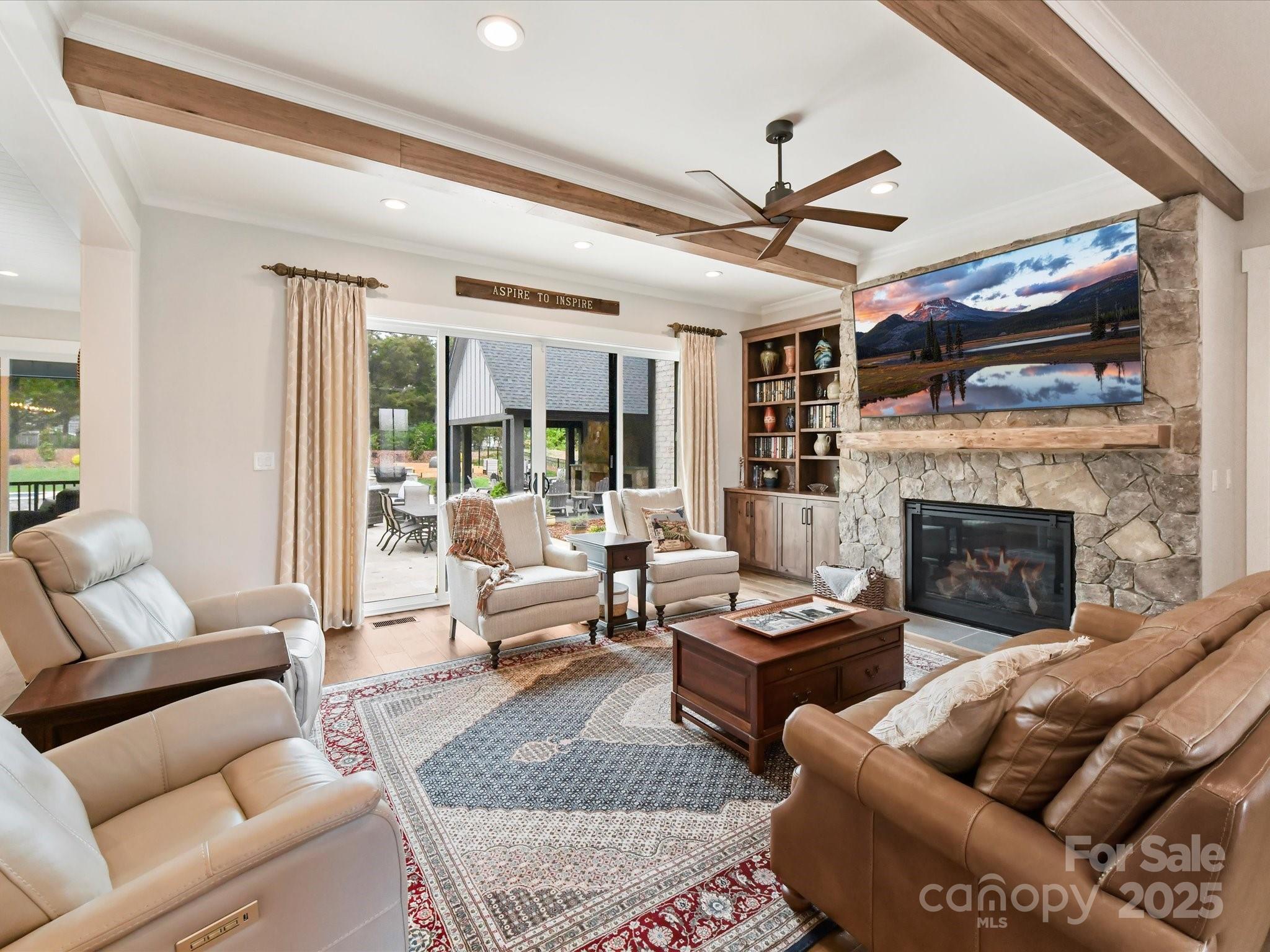 406 Sugar Maple Lane Weddington, NC 28104 - Photo 20 of 48 a living room with furniture and a fireplace