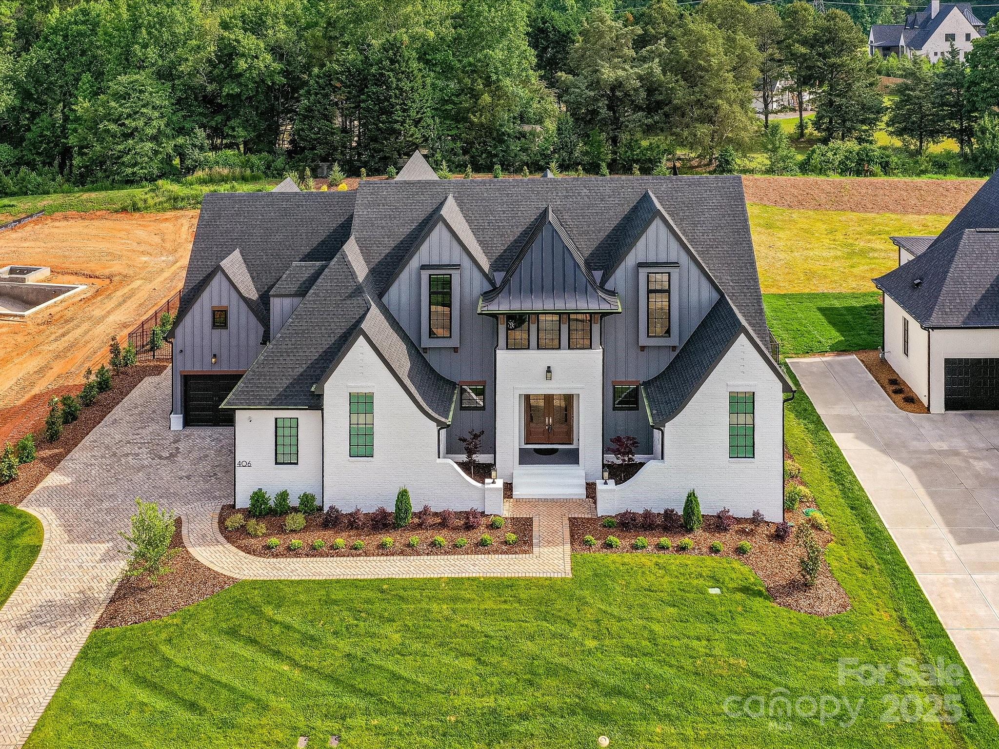 406 Sugar Maple Lane Weddington, NC 28104 - Photo 3 of 48 a aerial view of a house with a yard patio and balcony
