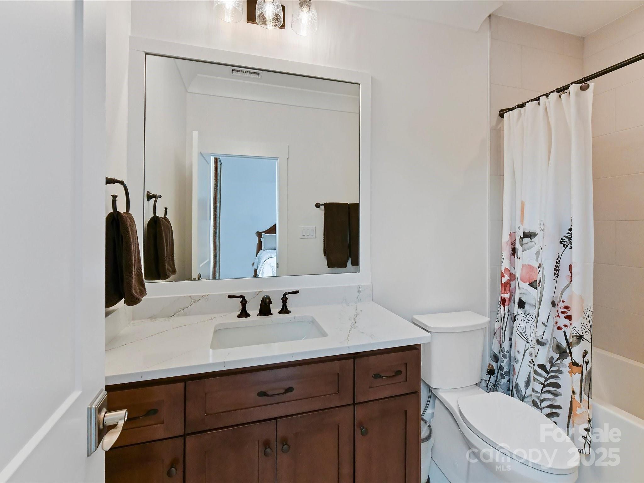 406 Sugar Maple Lane Weddington, NC 28104 - Photo 36 of 48 a bathroom with a sink toilet and shower
