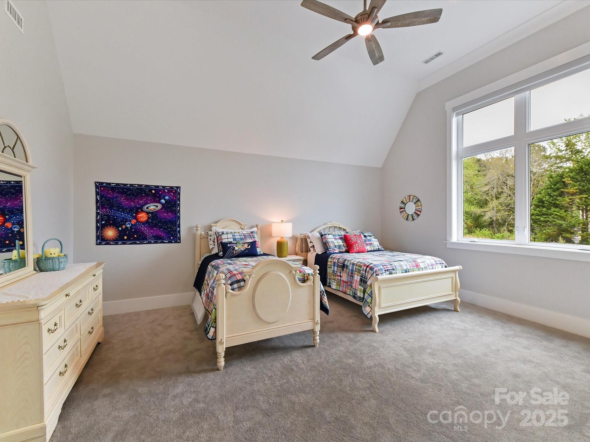406 Sugar Maple Lane Weddington, NC 28104 - Photo 39 of 48 a spacious bedroom with a bed and a window