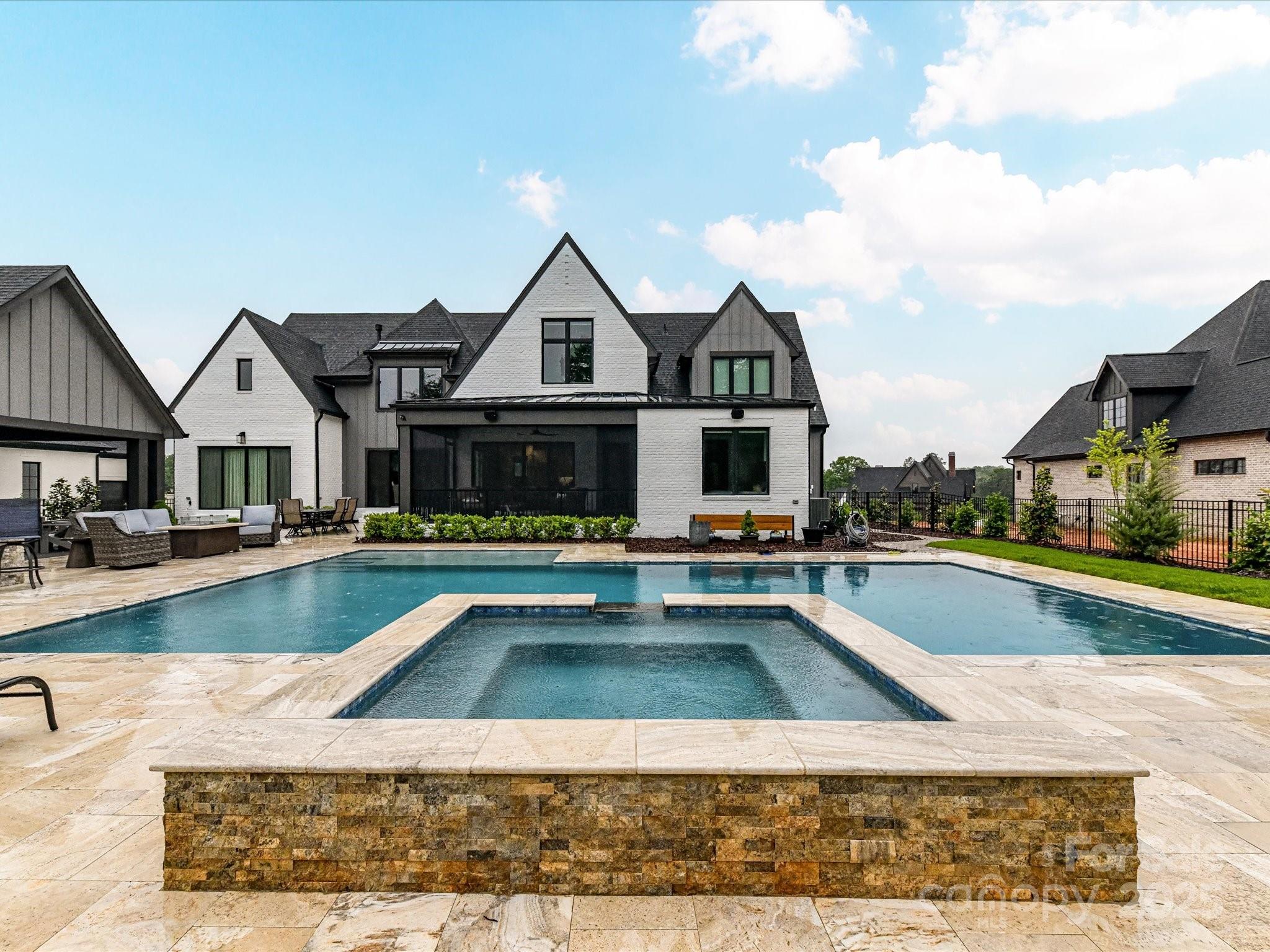 406 Sugar Maple Lane Weddington, NC 28104 - Photo 6 of 48 a view of a house with swimming pool and sitting area