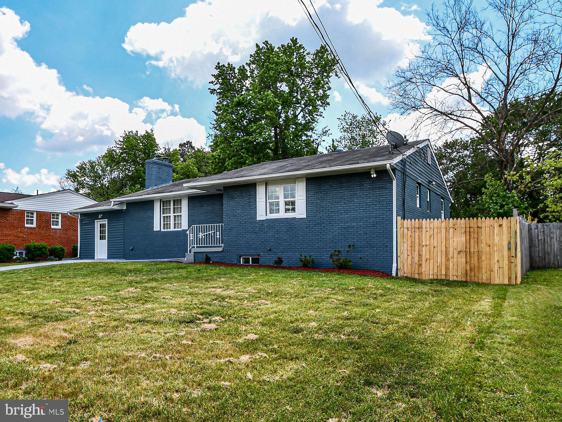 9303 Small Drive Clinton, MD 20735 - Photo 2 of 48 a view of a house with a yard