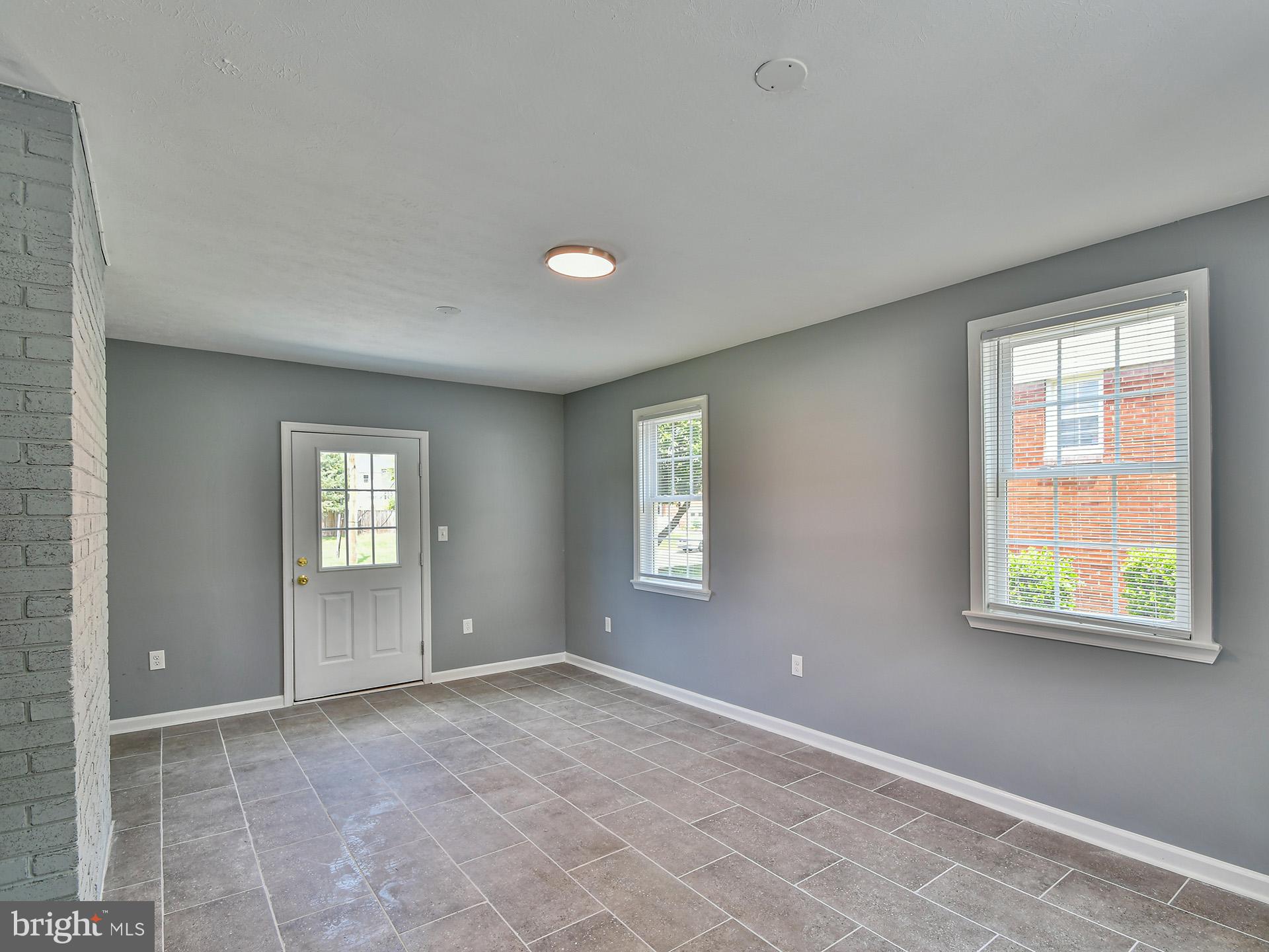 9303 Small Drive Clinton, MD 20735 - Photo 27 of 48 a view of an empty room with a window
