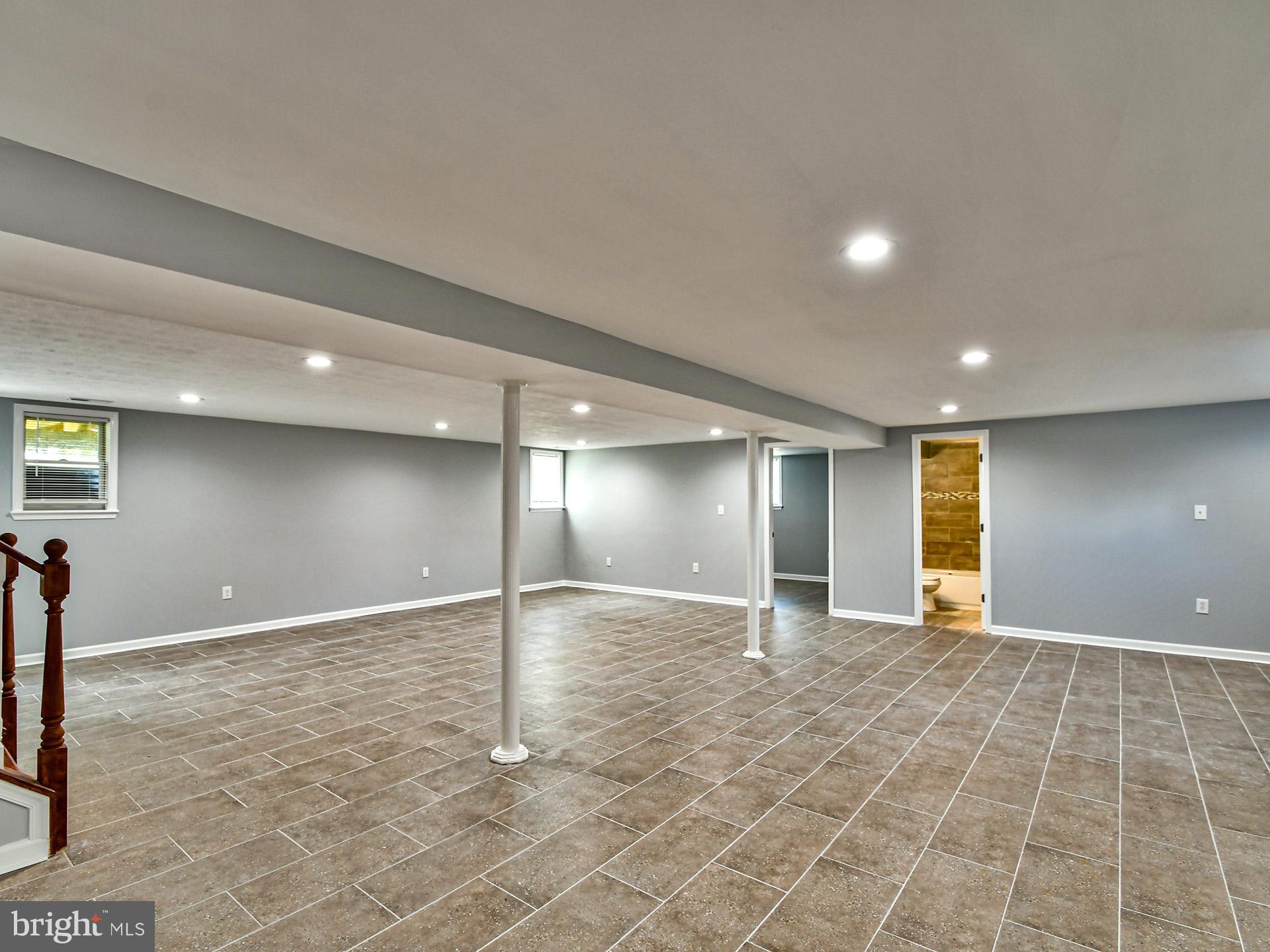 9303 Small Drive Clinton, MD 20735 - Photo 33 of 48 an empty room with a natural light