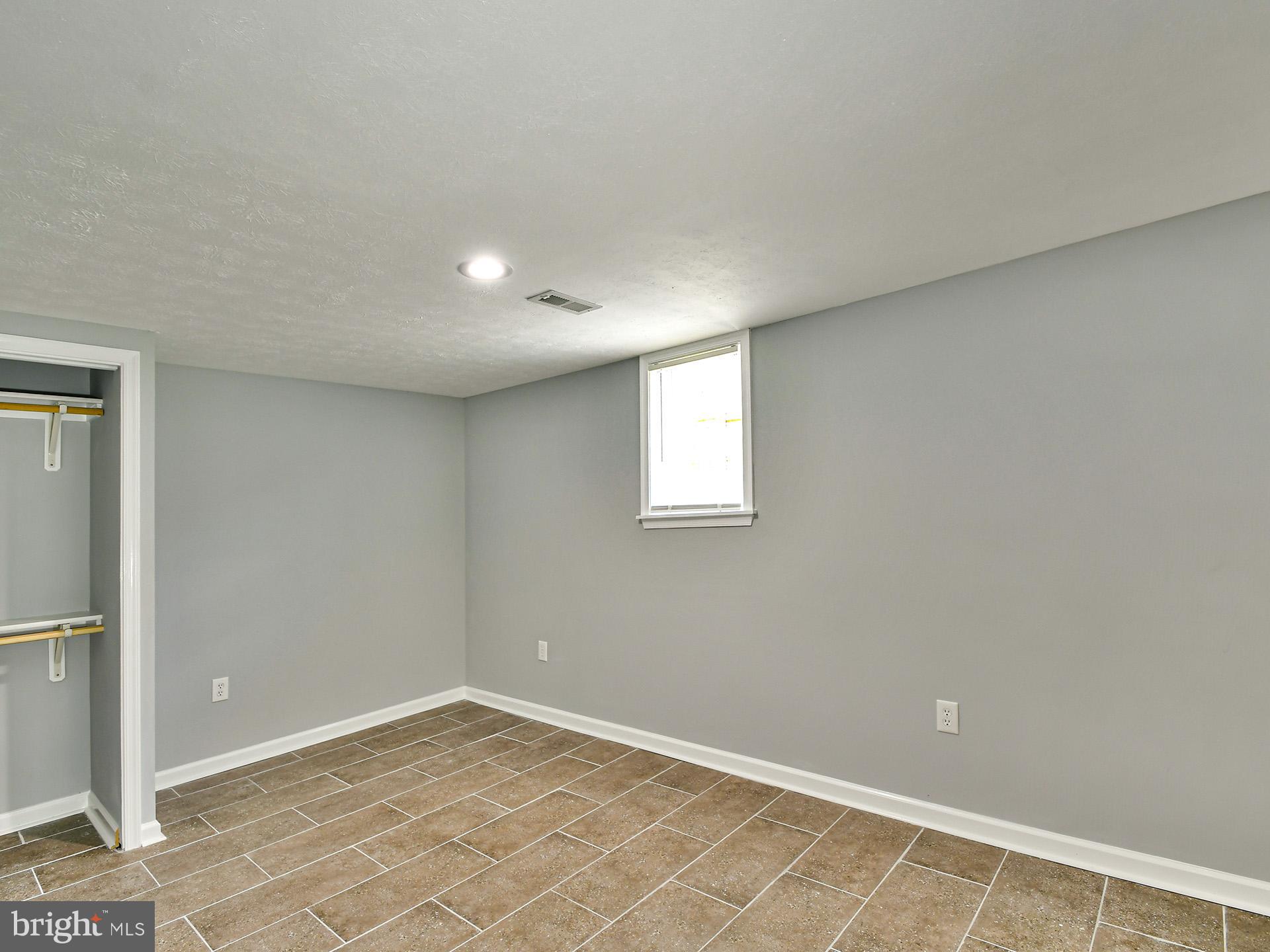 9303 Small Drive Clinton, MD 20735 - Photo 36 of 48 a view of empty room