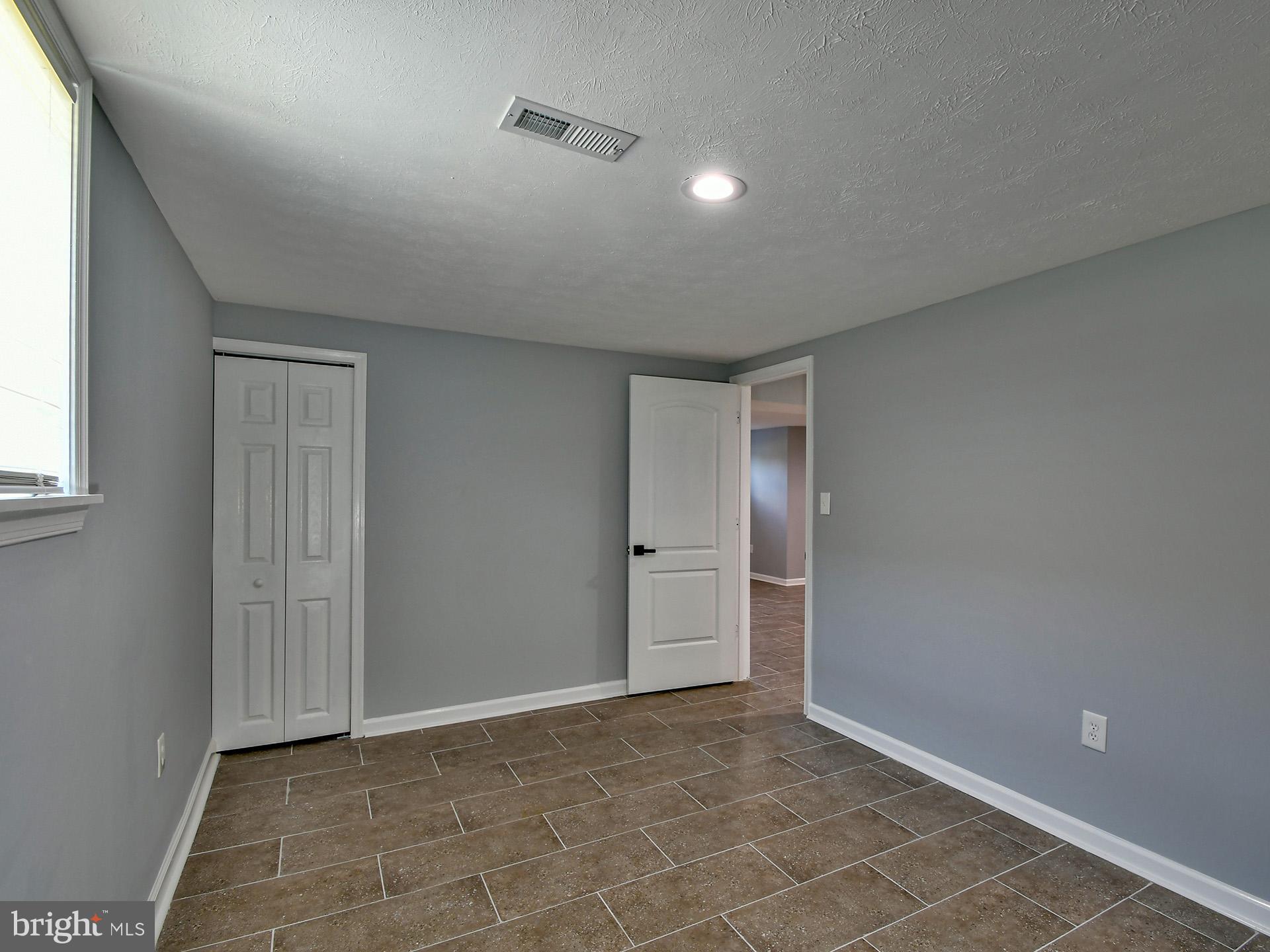 9303 Small Drive Clinton, MD 20735 - Photo 37 of 48 a view of an empty room