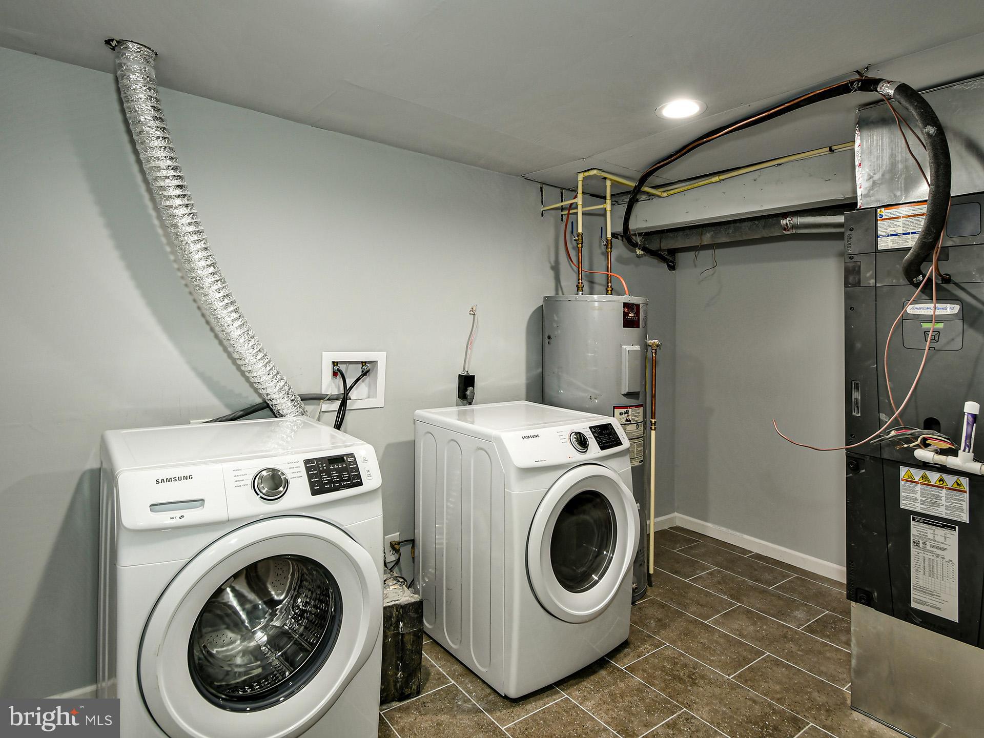9303 Small Drive Clinton, MD 20735 - Photo 43 of 48 a utility room with dryer and washer