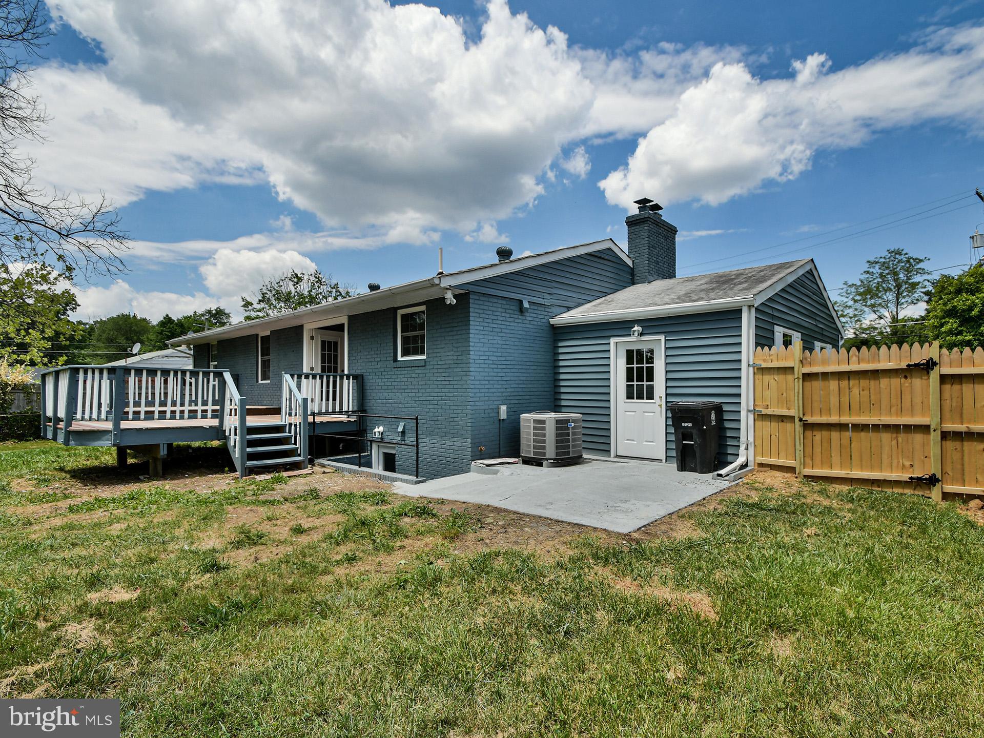 9303 Small Drive Clinton, MD 20735 - Photo 48 of 48 a view of a house with a yard and sitting area