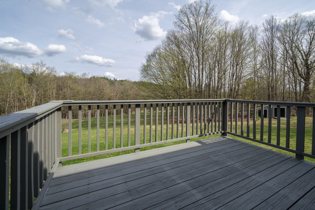 67 Bromley Road Huntington, MA 01050 - Photo 13 of 34 a view of balcony with wooden floor and fence