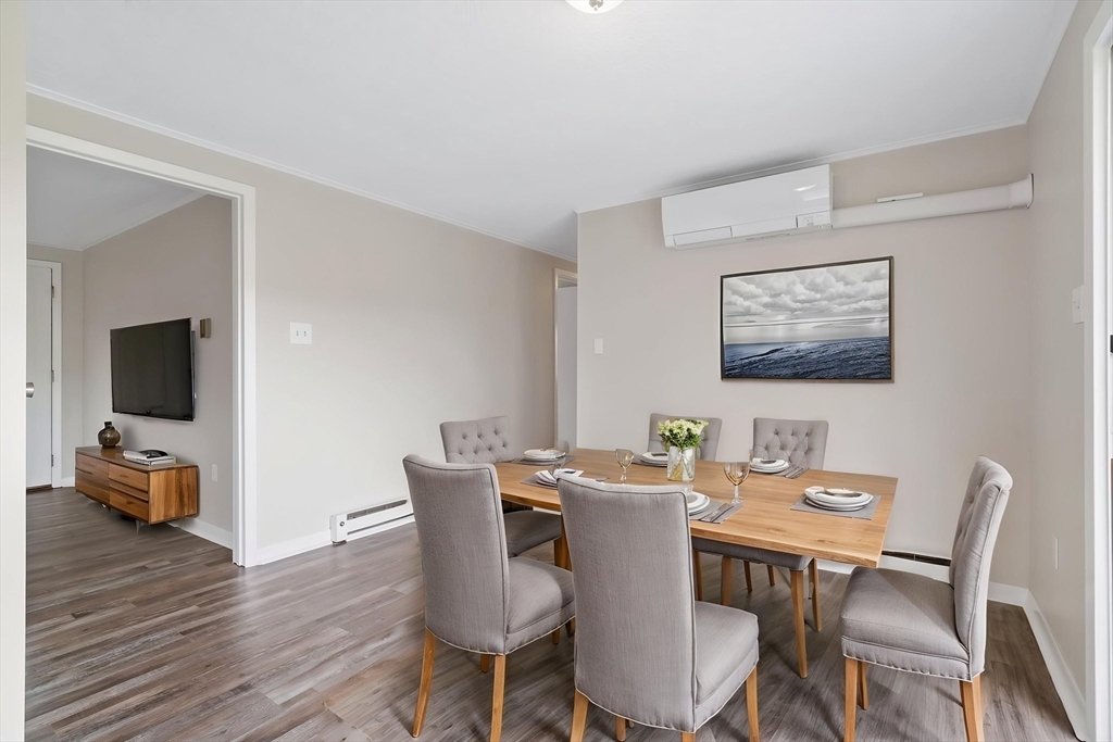 67 Bromley Road Huntington, MA 01050 - Photo 20 of 34 a view of a dining room with furniture wooden floor and painting on the wall
