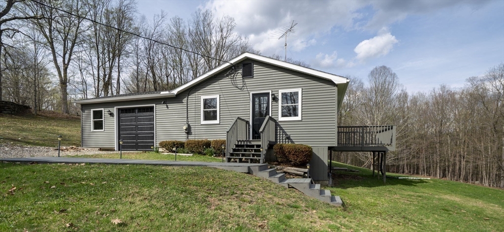 67 Bromley Road Huntington, MA 01050 - Photo 2 of 34 a view of a house with backyard