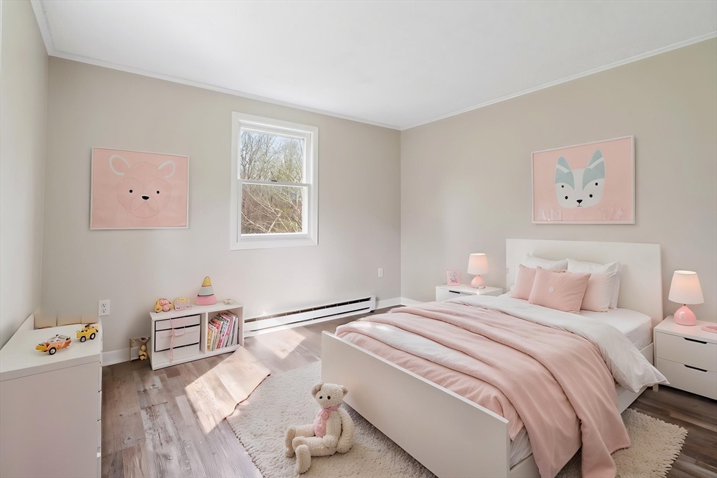 67 Bromley Road Huntington, MA 01050 - Photo 26 of 34 a bedroom with a bed and a window