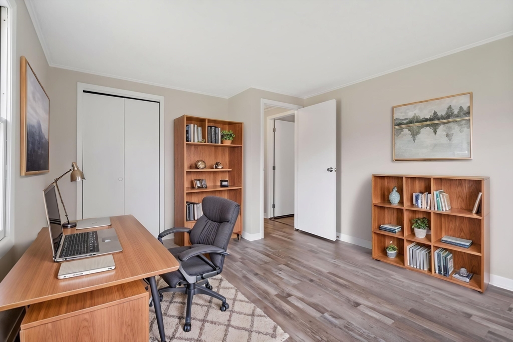 67 Bromley Road Huntington, MA 01050 - Photo 30 of 34 a view of a workspace with furniture and wooden floor