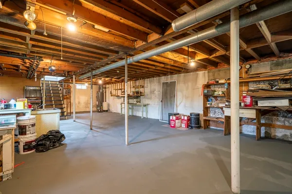 a view of a garage with rack and bicycle