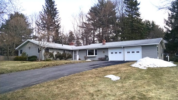 5 Emerson Road Wayland, MA 01778 - Photo 1 of 14 a front view of a house with a yard and garage