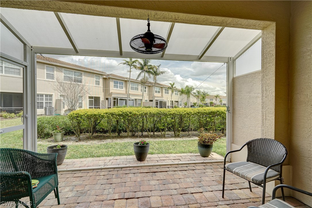 4089 Cherrybrook Loop Fort Myers, FL 33966 - Photo 31 of 35 a view of a porch with chairs and backyard