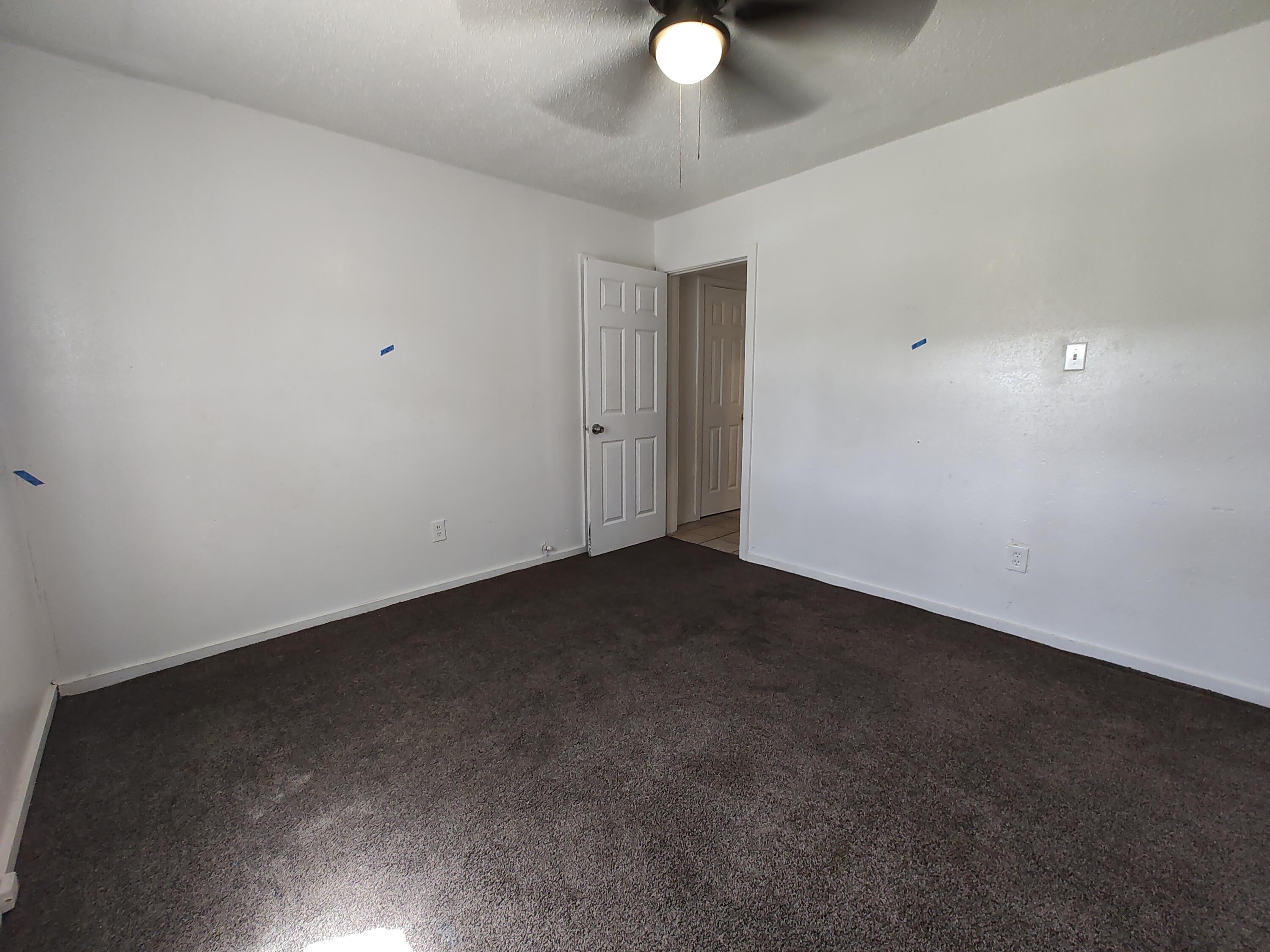 1803 49th Street Lubbock, TX 79412 - Photo 9 of 12 a view of a livingroom with window