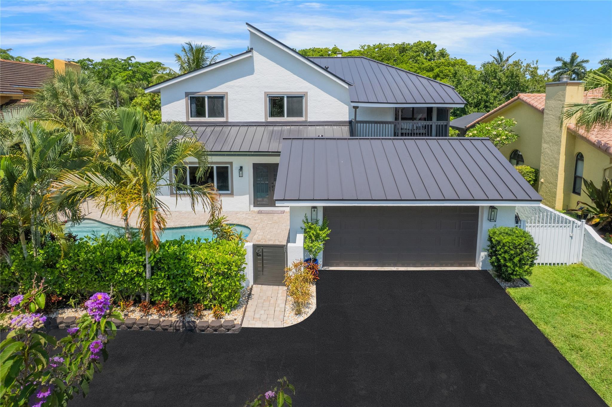 front view of a house with a yard