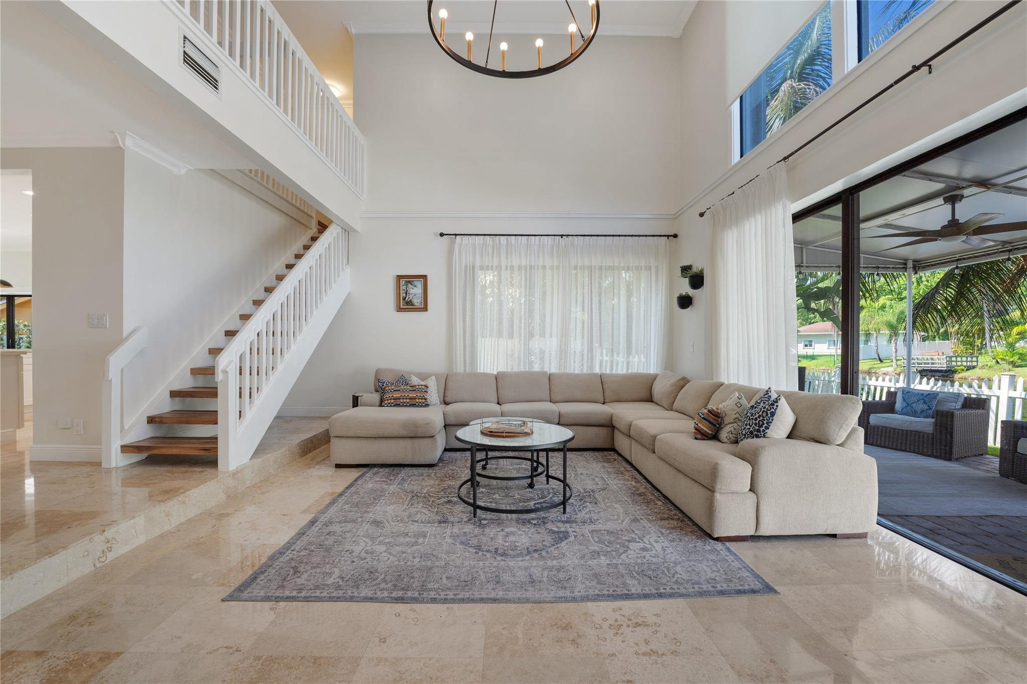 741 Mockingbird Lane Plantation, FL 33324 - Photo 12 of 59 a living room with furniture and a large window
