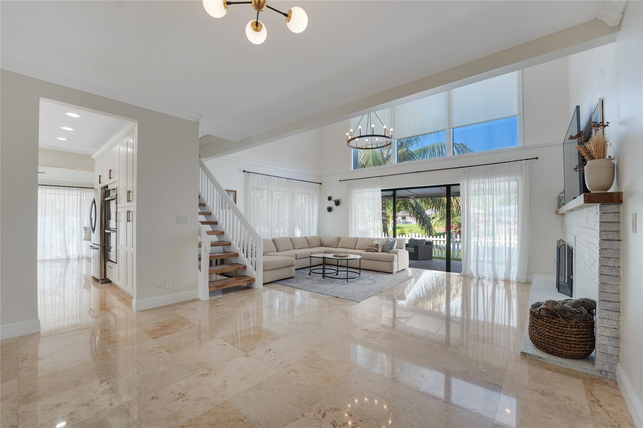 741 Mockingbird Lane Plantation, FL 33324 - Photo 15 of 59 a living room with furniture and a large window