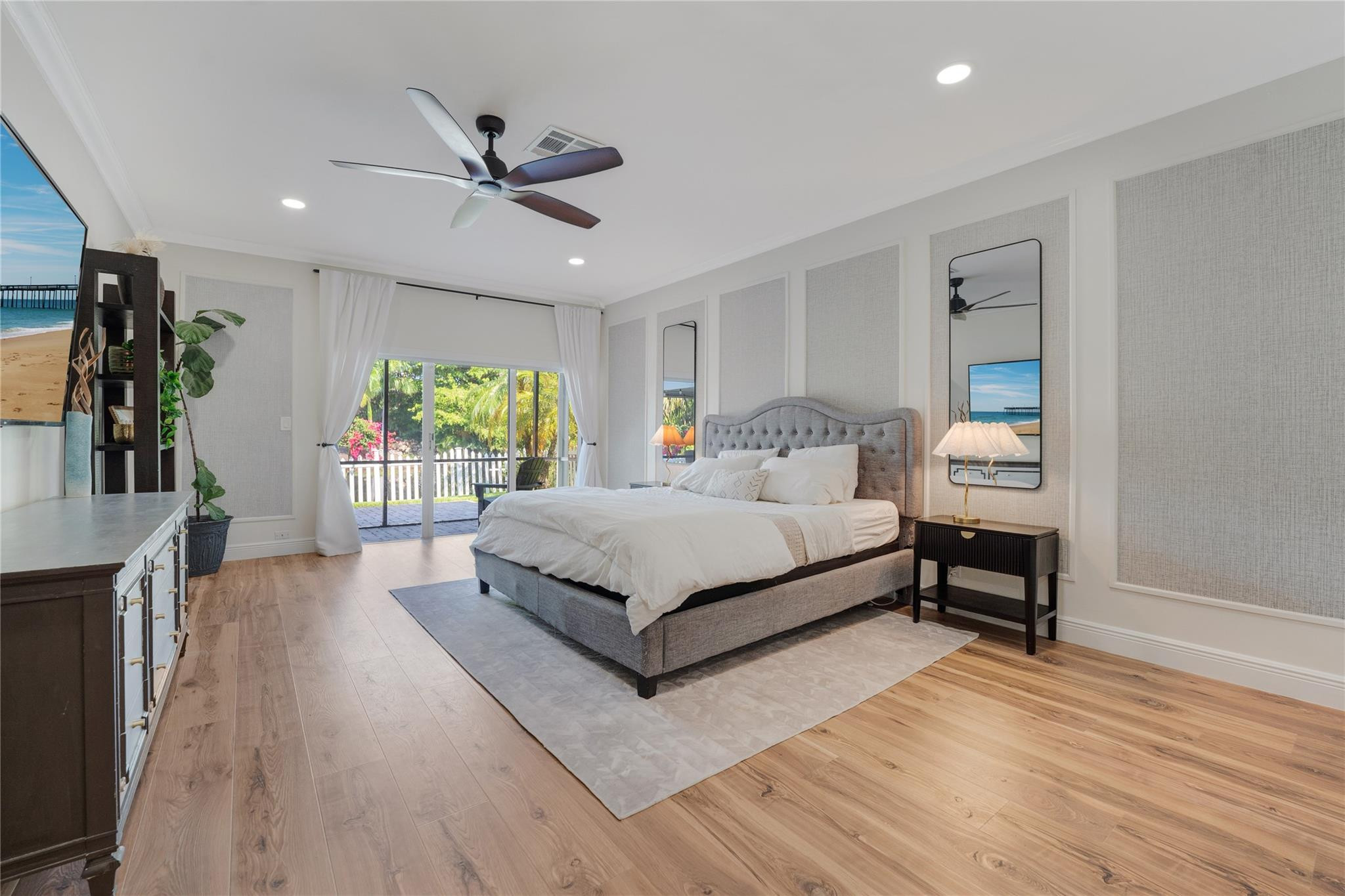 741 Mockingbird Lane Plantation, FL 33324 - Photo 17 of 59 a bedroom with a bed and a large window