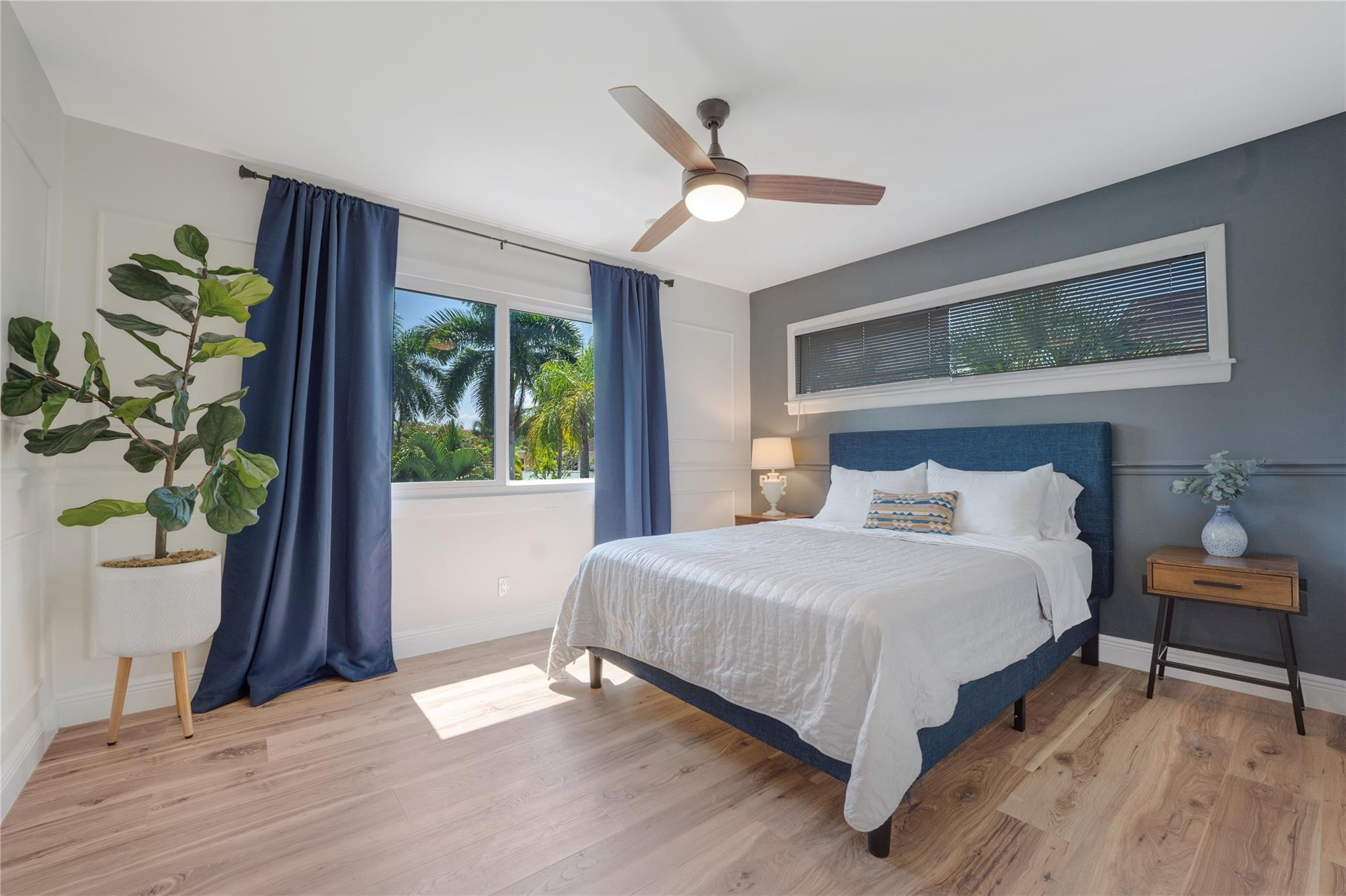 741 Mockingbird Lane Plantation, FL 33324 - Photo 27 of 59 a bedroom with a bed table and a window