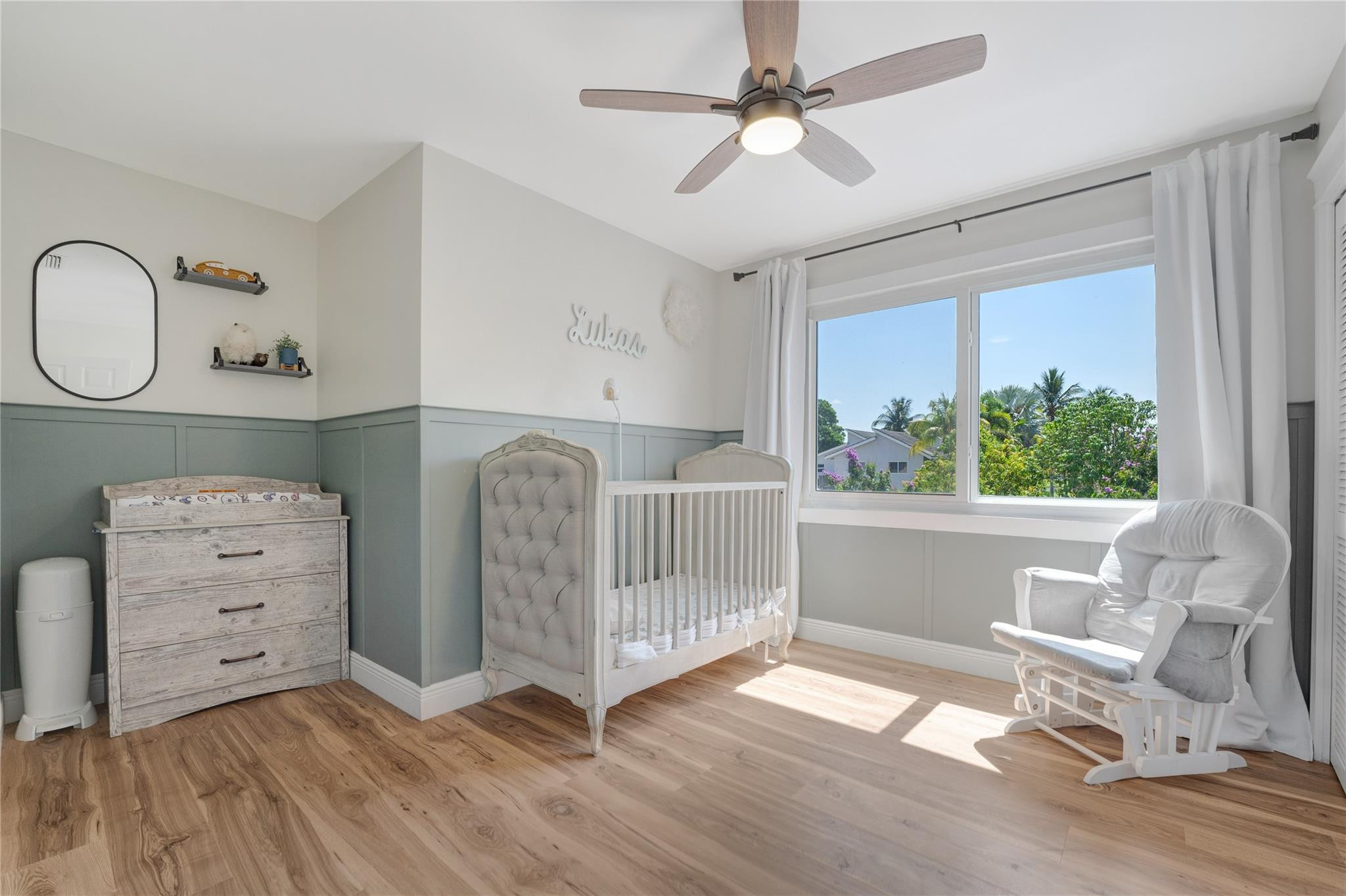 741 Mockingbird Lane Plantation, FL 33324 - Photo 28 of 59 a view of a bedroom with furniture window and wooden floor