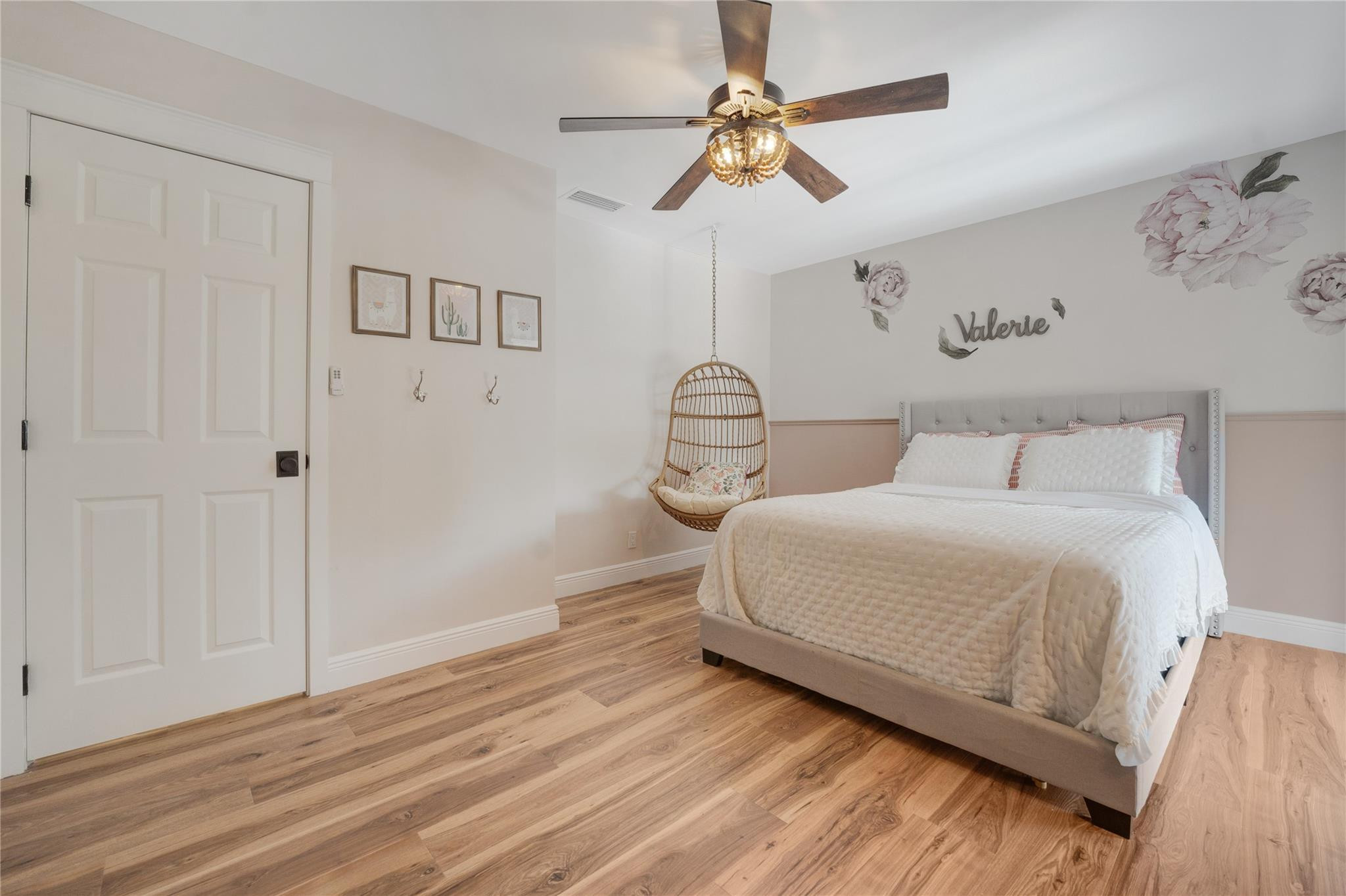 741 Mockingbird Lane Plantation, FL 33324 - Photo 30 of 59 a bedroom with a bed and a chandelier