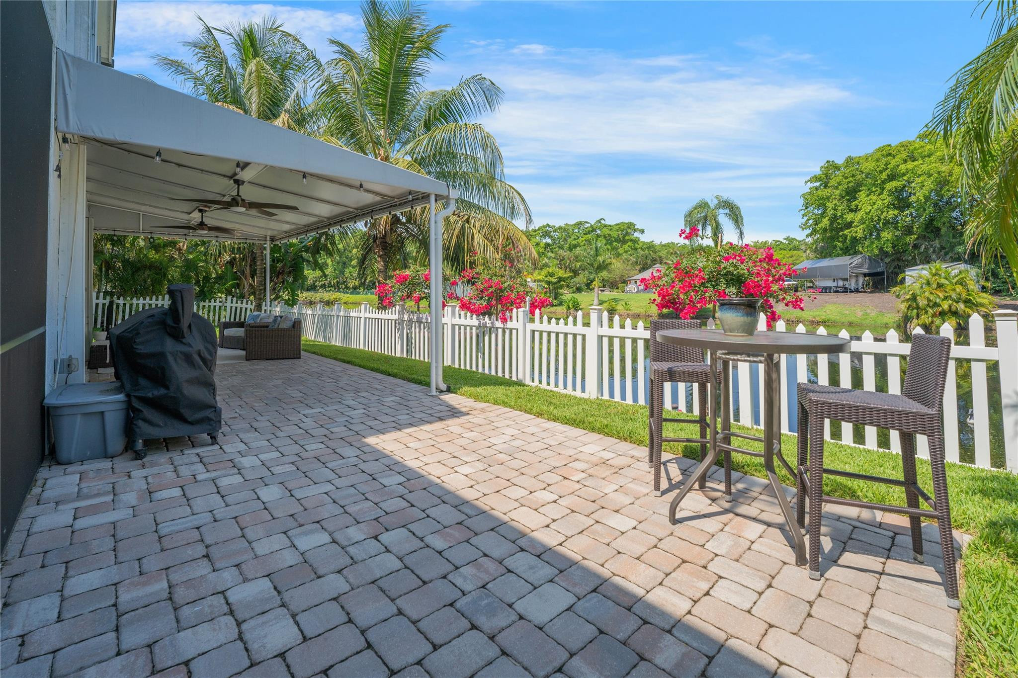 741 Mockingbird Lane Plantation, FL 33324 - Photo 47 of 59 a view of a porch with furniture and a yard