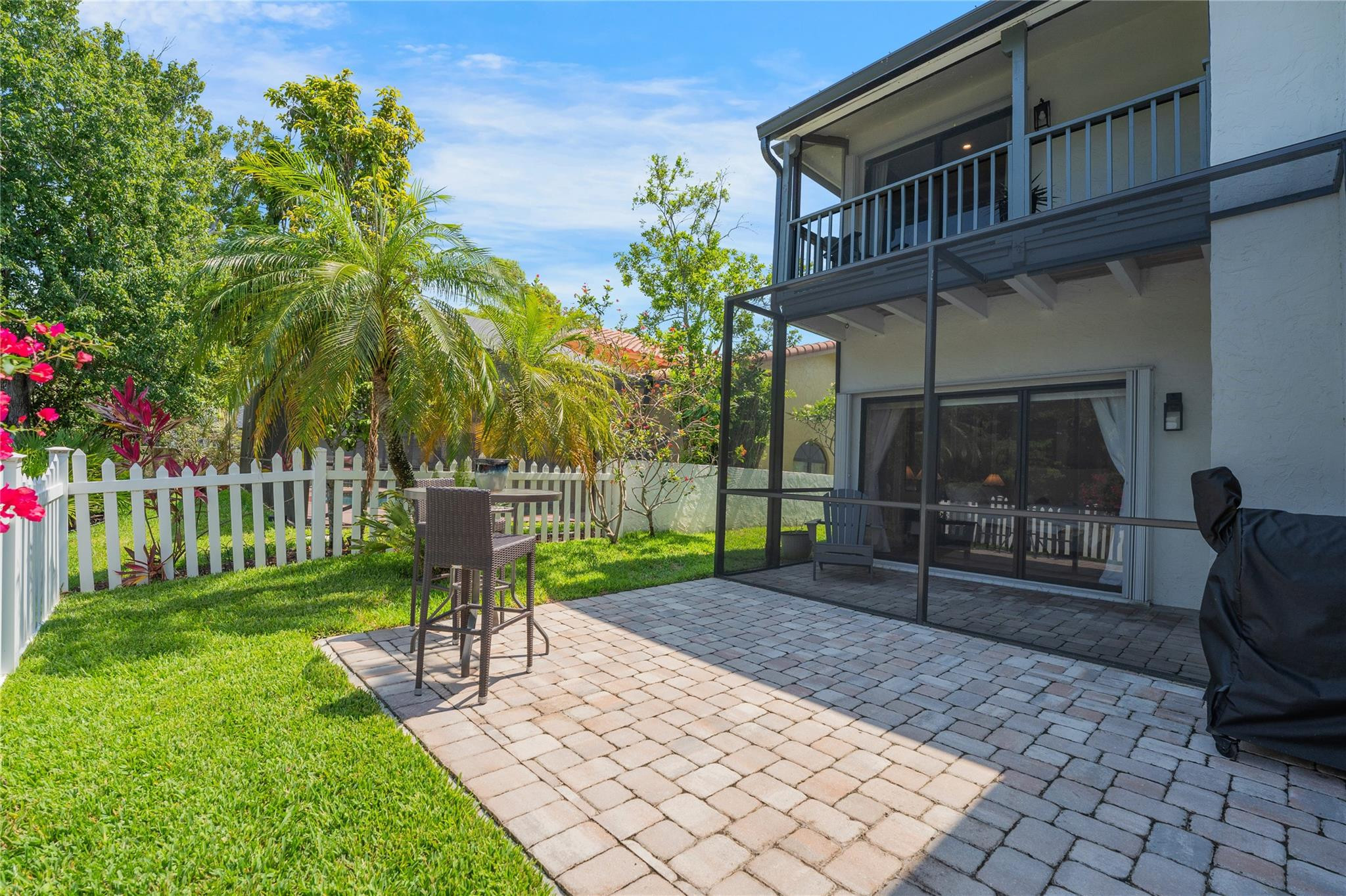 741 Mockingbird Lane Plantation, FL 33324 - Photo 48 of 59 a view of a chair and table in backyard of the house