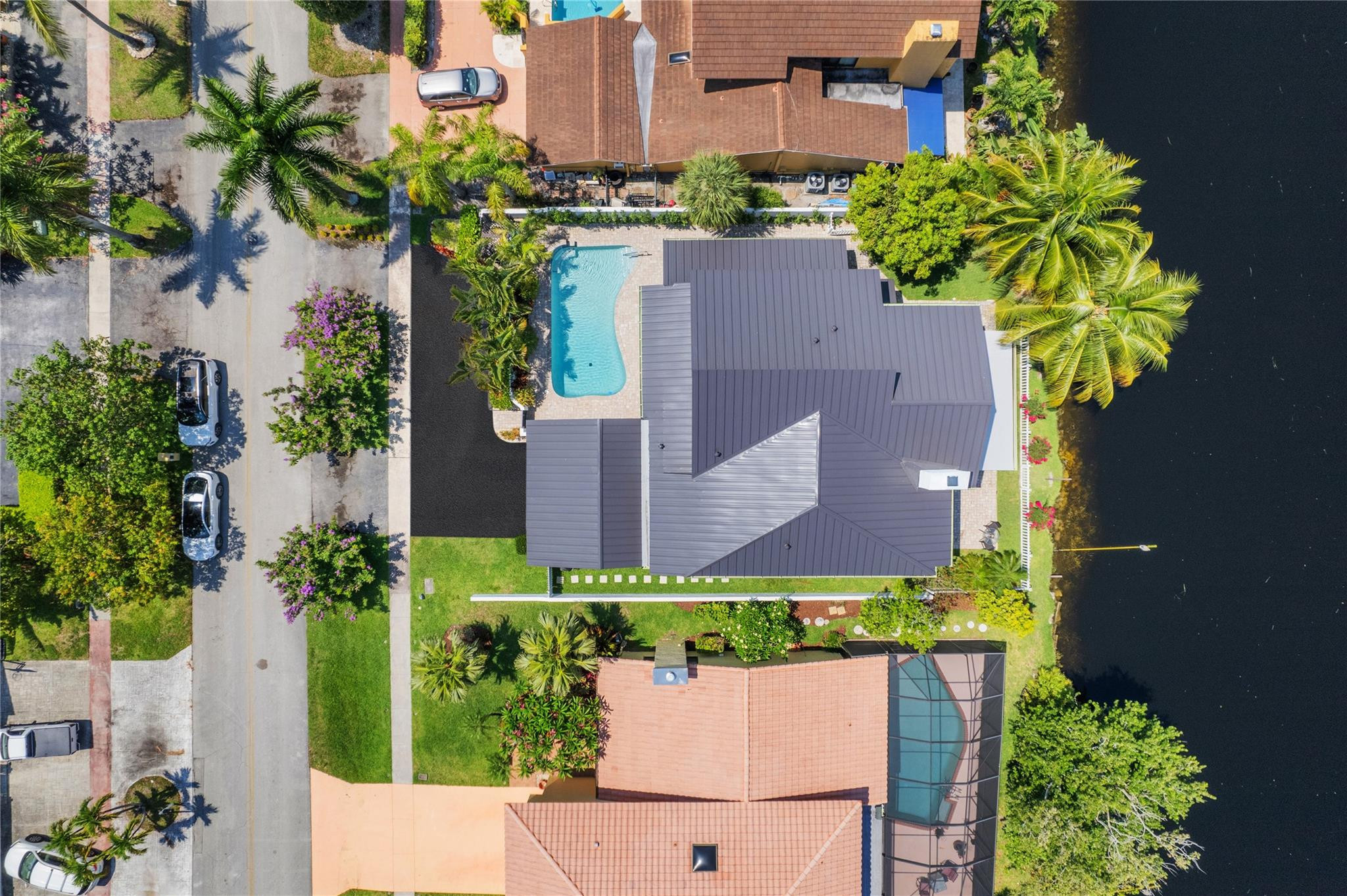 741 Mockingbird Lane Plantation, FL 33324 - Photo 53 of 59 an aerial view of a house with a yard and garden