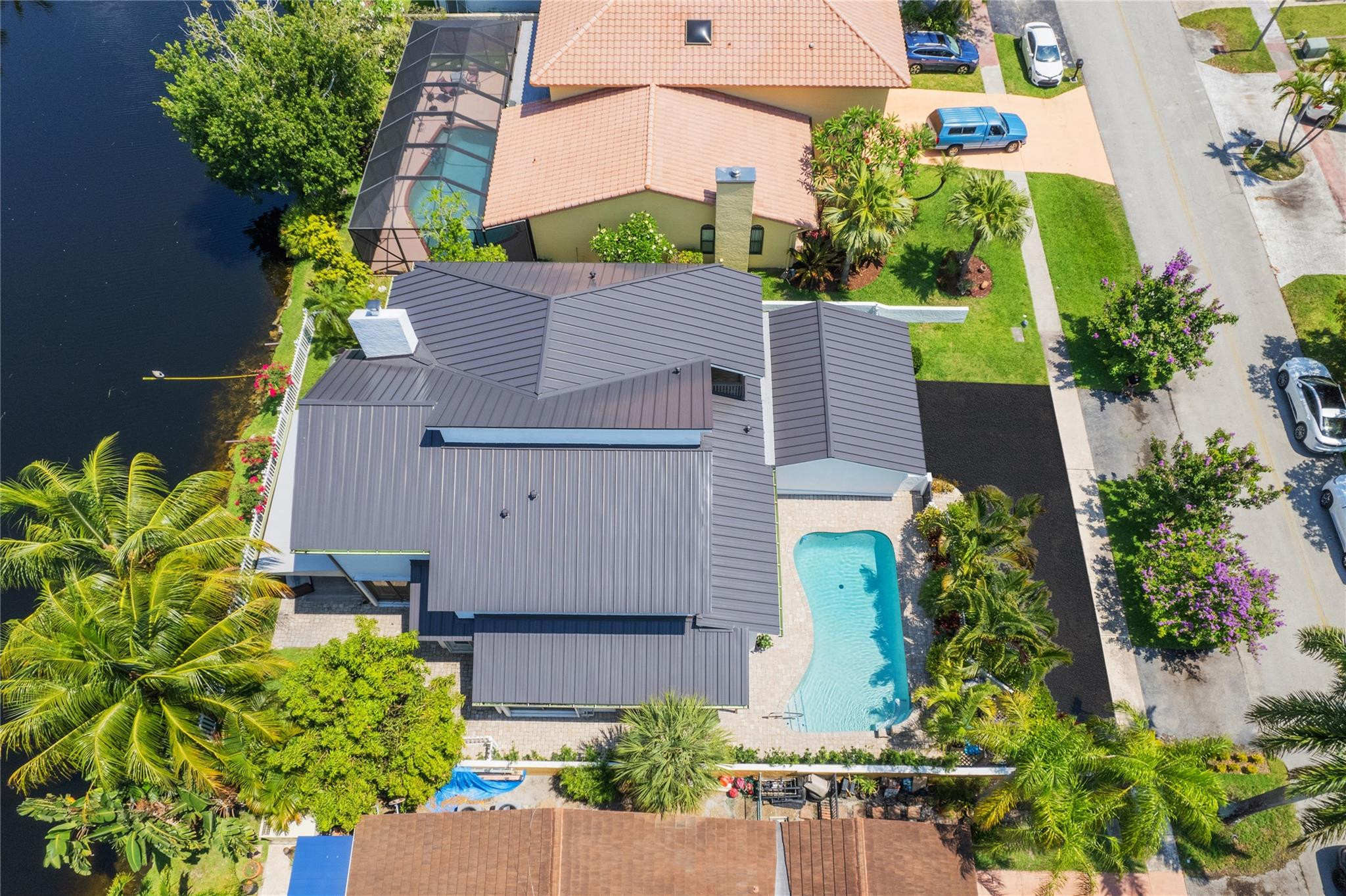 741 Mockingbird Lane Plantation, FL 33324 - Photo 54 of 59 an aerial view of a house with a yard and garden