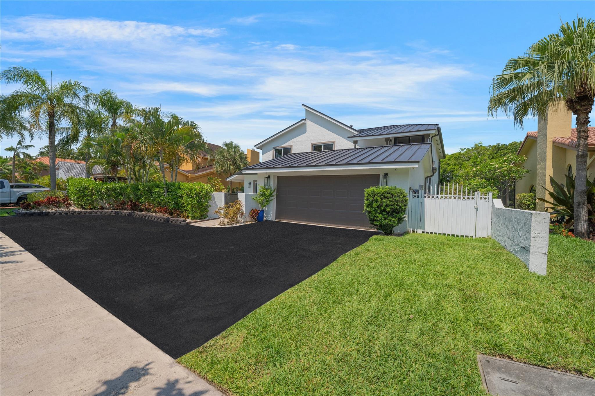 741 Mockingbird Lane Plantation, FL 33324 - Photo 55 of 59 front view of a house with a yard