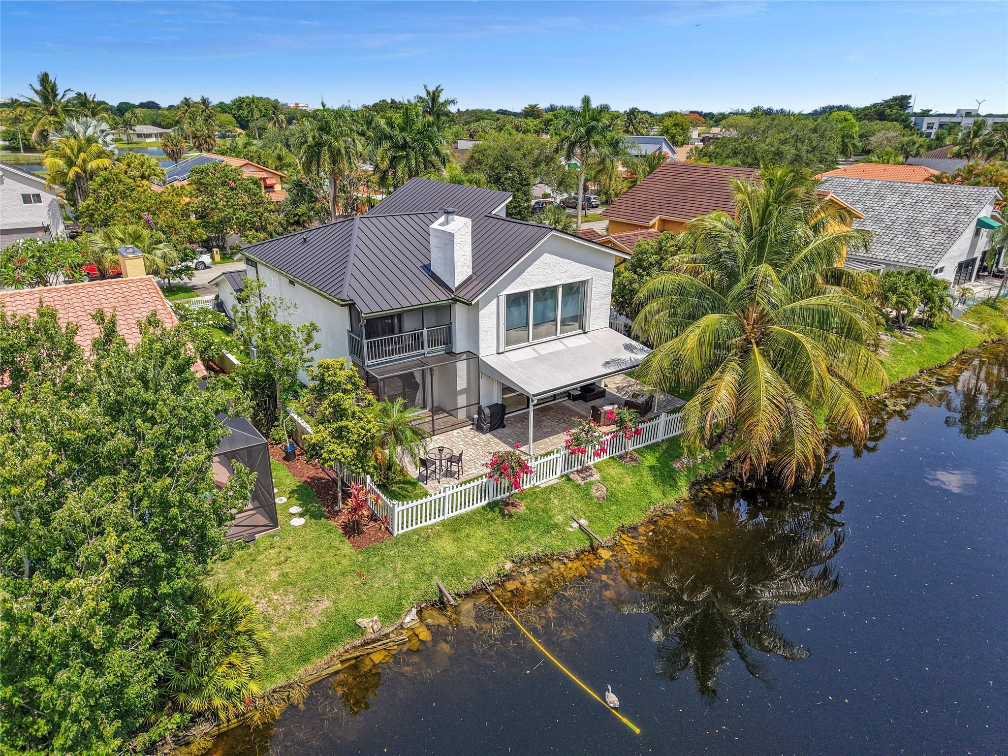741 Mockingbird Lane Plantation, FL 33324 - Photo 57 of 59 an aerial view of a house with a garden
