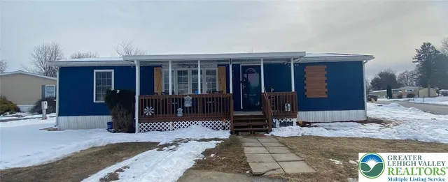a view of a house with a porch