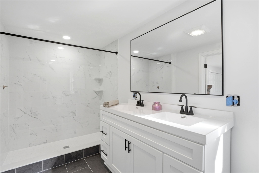 357 Wareham Street Middleboro, MA 02346 - Photo 21 of 42 a bathroom with a sink and a mirror