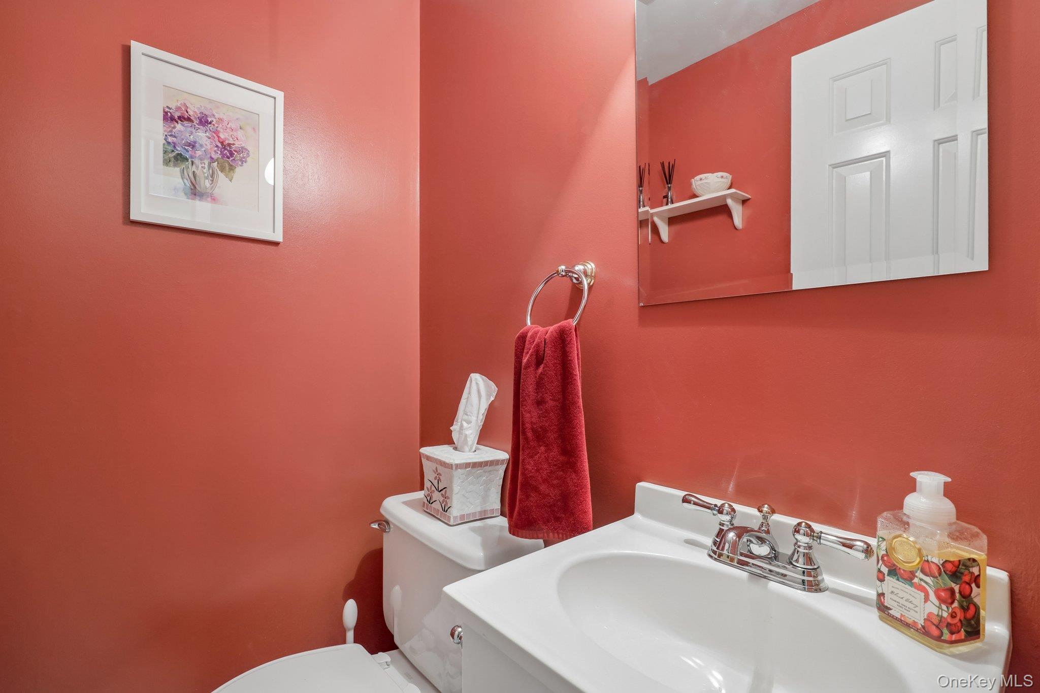 360 Birchwood Road Medford, NY 11763 - Photo 10 of 41 Powder room, ideal location at base of staircase.
