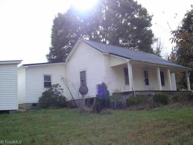 1171 Badgett Road King, NC 27021 - Photo 1 of 8 Exterior Front. front of house faces mountains