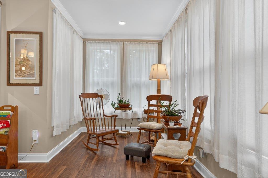 281 Jule Ingram Road Milledgeville, GA 31061 - Photo 17 of 79 a dining room with furniture and wooden floor