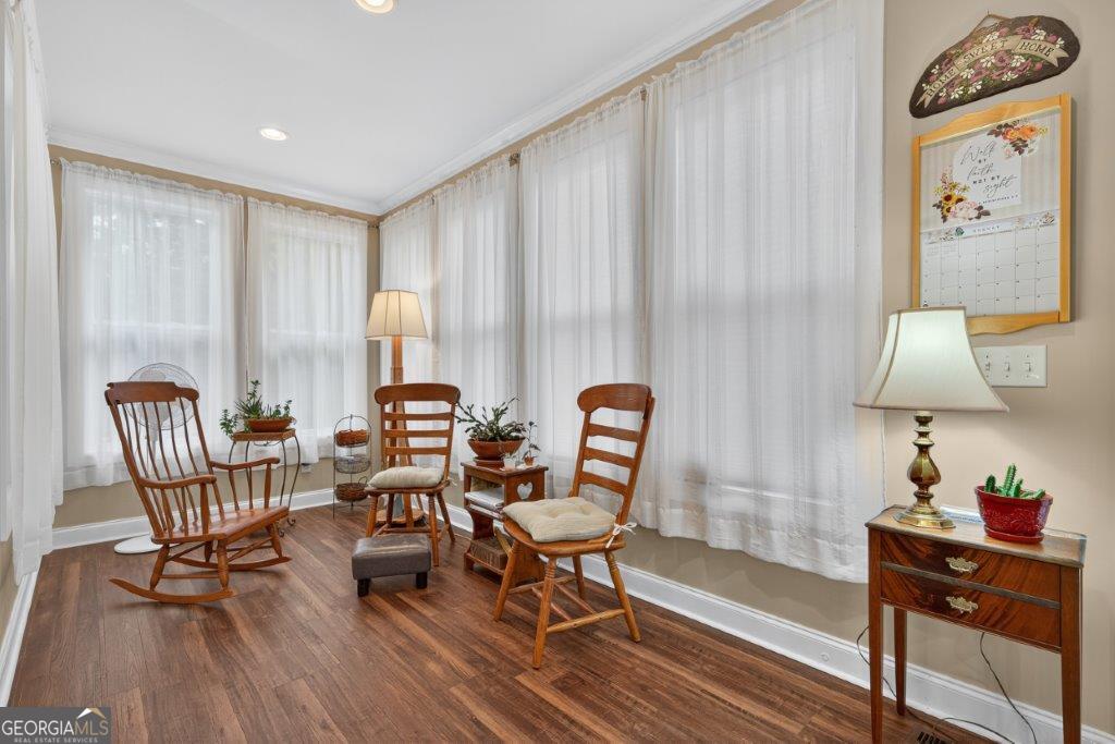 281 Jule Ingram Road Milledgeville, GA 31061 - Photo 18 of 79 a living room with furniture and a window