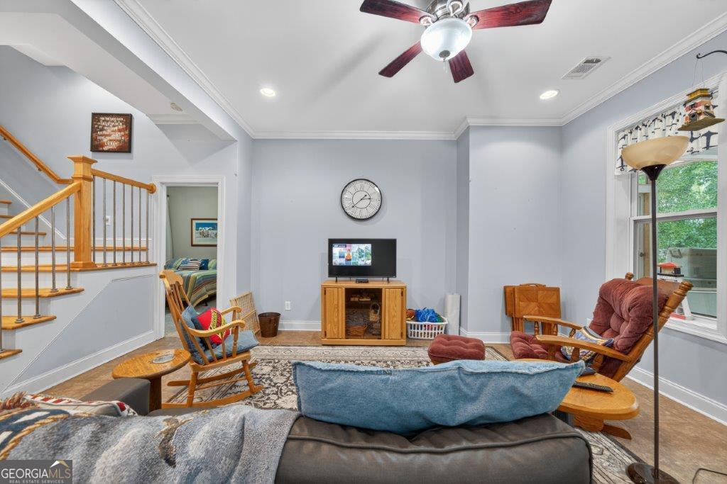 281 Jule Ingram Road Milledgeville, GA 31061 - Photo 40 of 79 a living room with furniture and a window