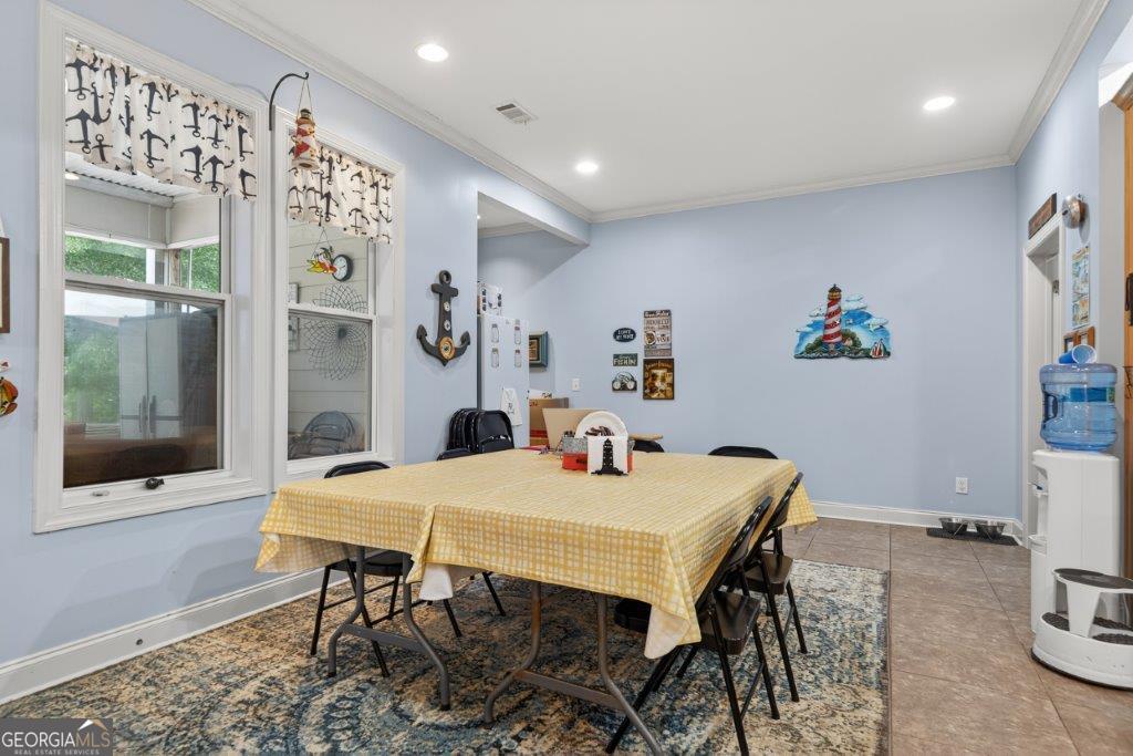 281 Jule Ingram Road Milledgeville, GA 31061 - Photo 42 of 79 a view of a dining room with furniture