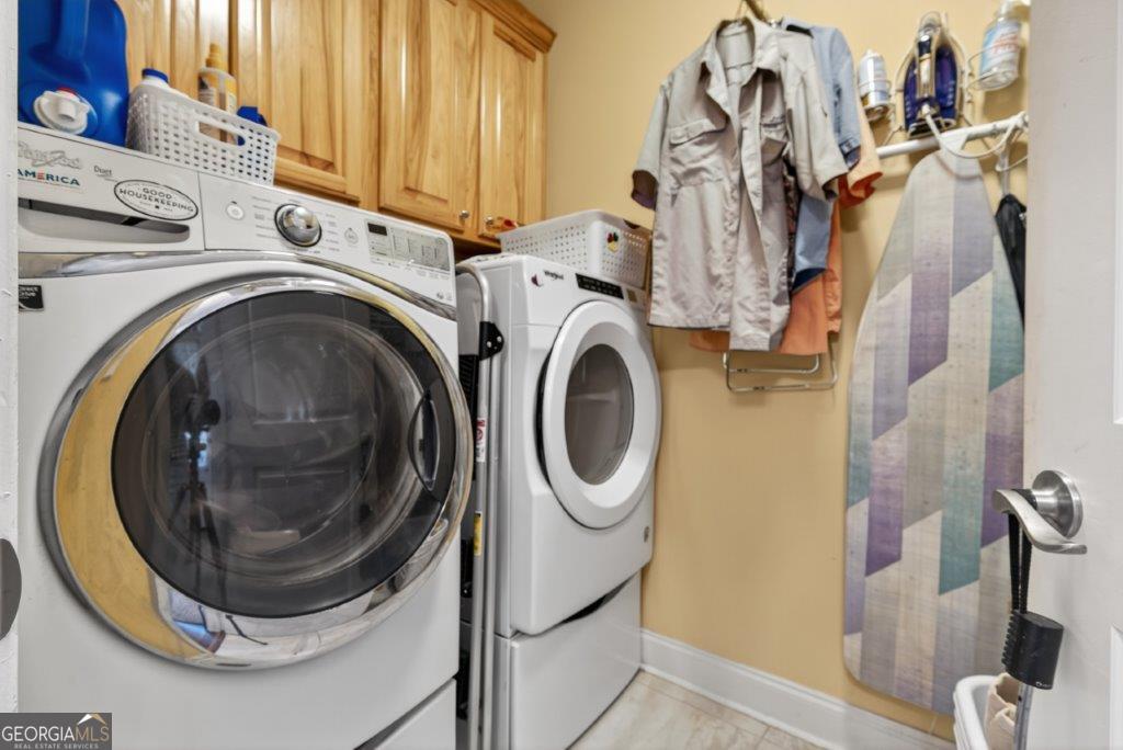 281 Jule Ingram Road Milledgeville, GA 31061 - Photo 54 of 79 a utility room with dryer and washer