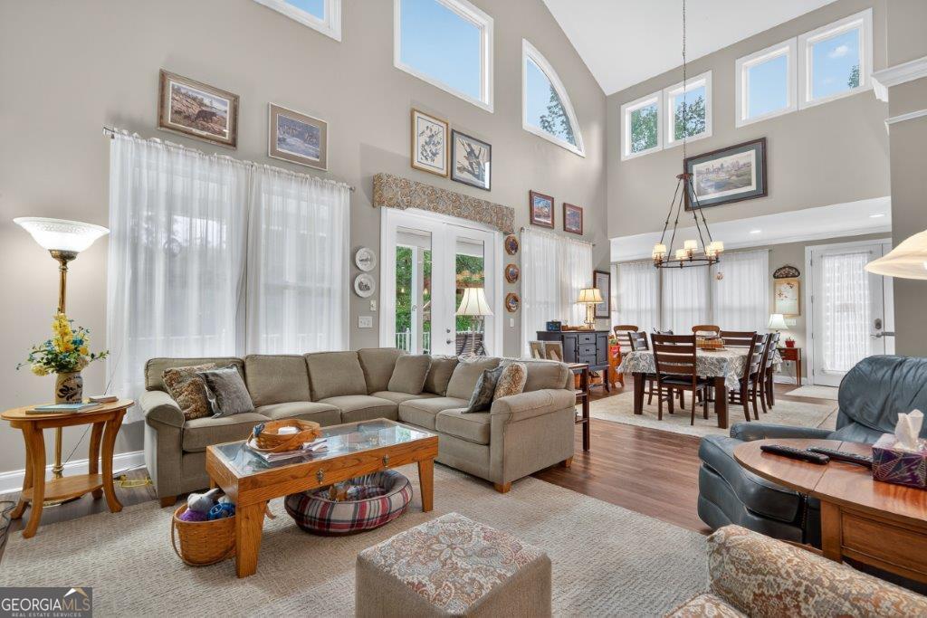 281 Jule Ingram Road Milledgeville, GA 31061 - Photo 6 of 79 a living room with furniture chess table and a large window